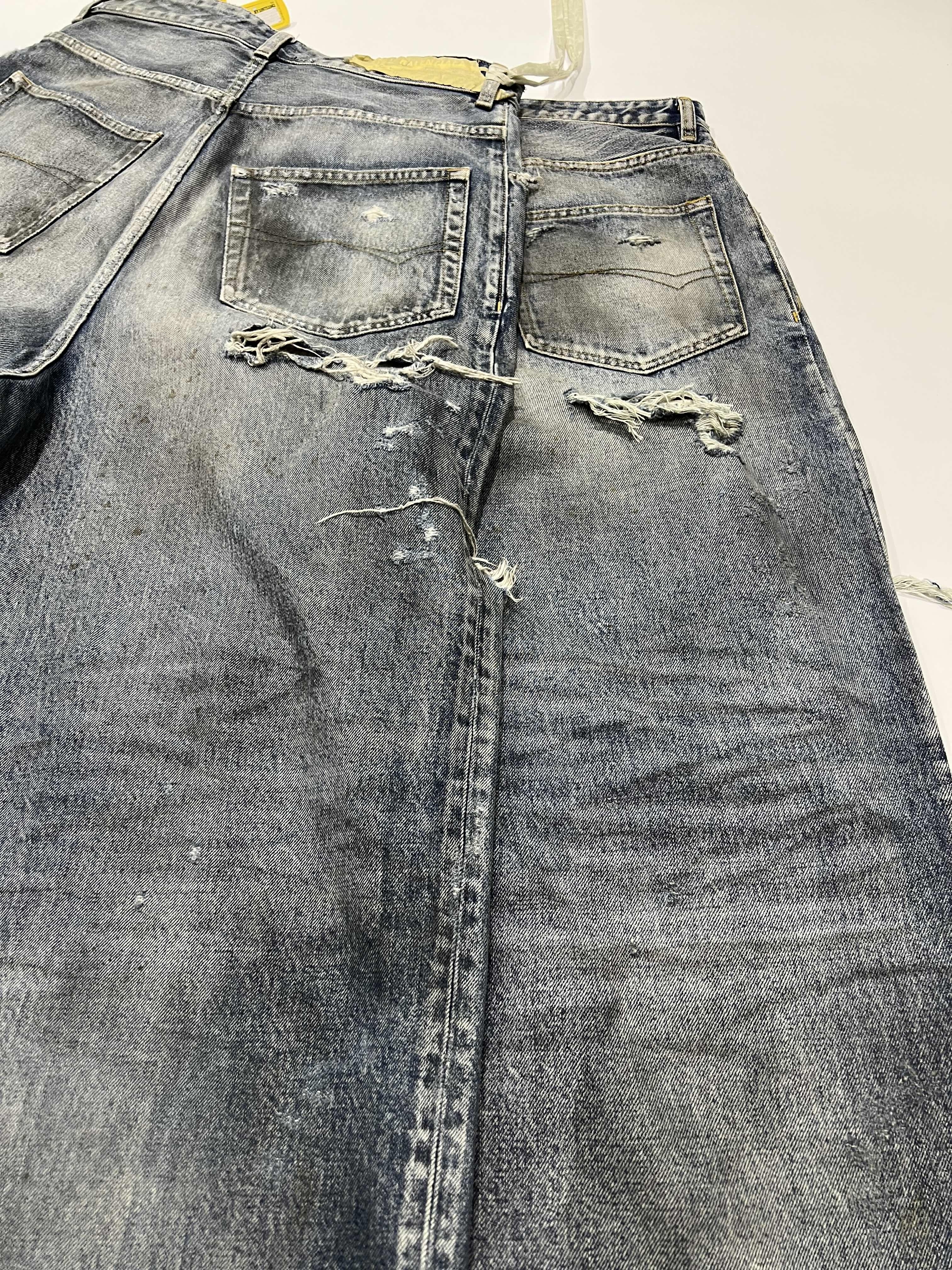 Balenciaga Distressed wide-leg jeans vista 7